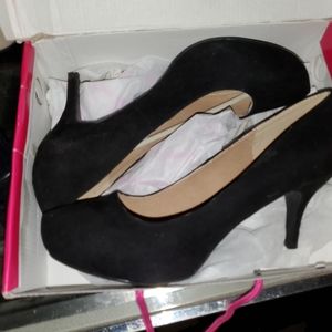 Black suede pumps